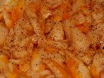 Haddock émietté et assaisonné de sel, poivre et curry